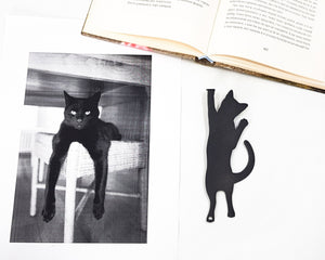 Cat Got Stuck Bookmark - Whimsical and Playful Design for Avid Readers and Cat Lovers - Atelier Article