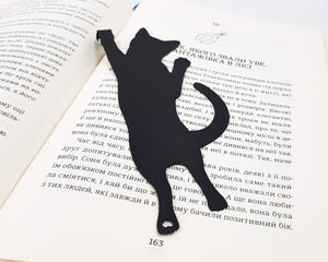 Cat Got Stuck Bookmark - Whimsical and Playful Design for Avid Readers and Cat Lovers - Atelier Article