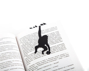 Monkey, Library in the Jungle metal bookmark marking a page in an open book