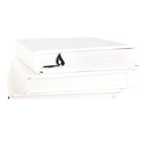 Burning Lucifer Match metal bookmark shown with a stack of books