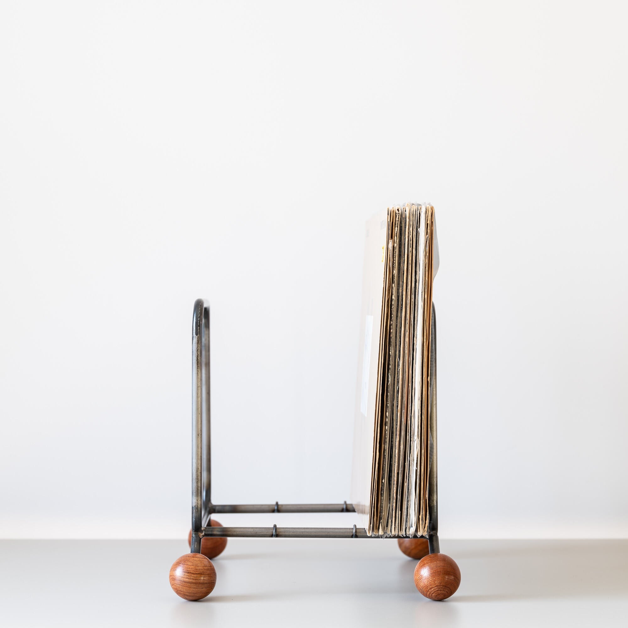 Minimalist Vinyl Record Rack with Wooden Ball Feet – Modern Metal LP Stand - Atelier Article