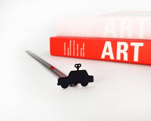 Wind-Up Toy Car metal bookmark against a coloured backdrop, view 5