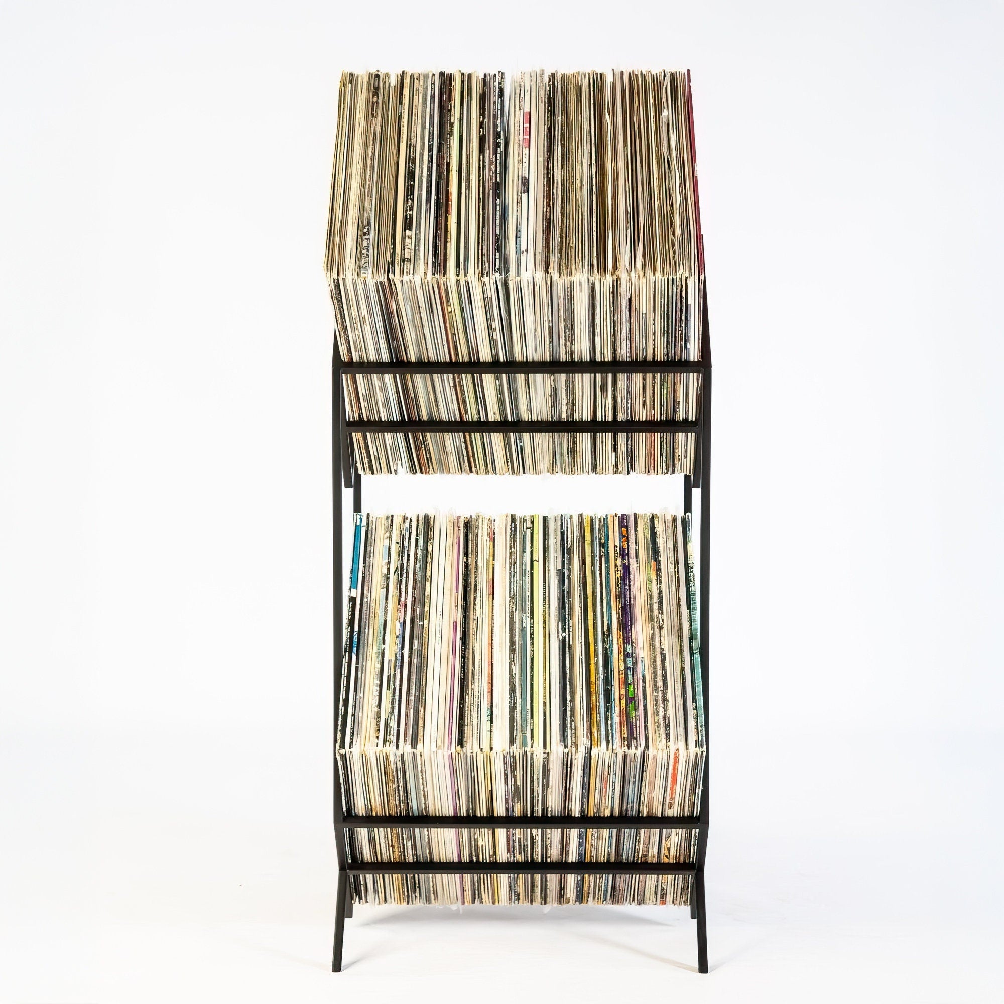 Rear view of black Atelier Article 2Romb two-tier vinyl record stand filled with LPs