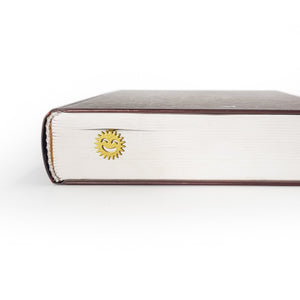 Smiling Sun Metal Bookmark – A Little Sunshine Between the Pages - Atelier Article