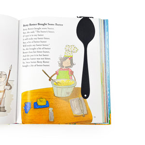Black metal spoon-shaped bookmark placed inside a children’s book open to the poem Betty Botter Bought Some Butter, next to a colorful cooking illustration.