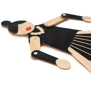 Flamenco puppet detail — face, necklace, movable arm joints and black printed plywood