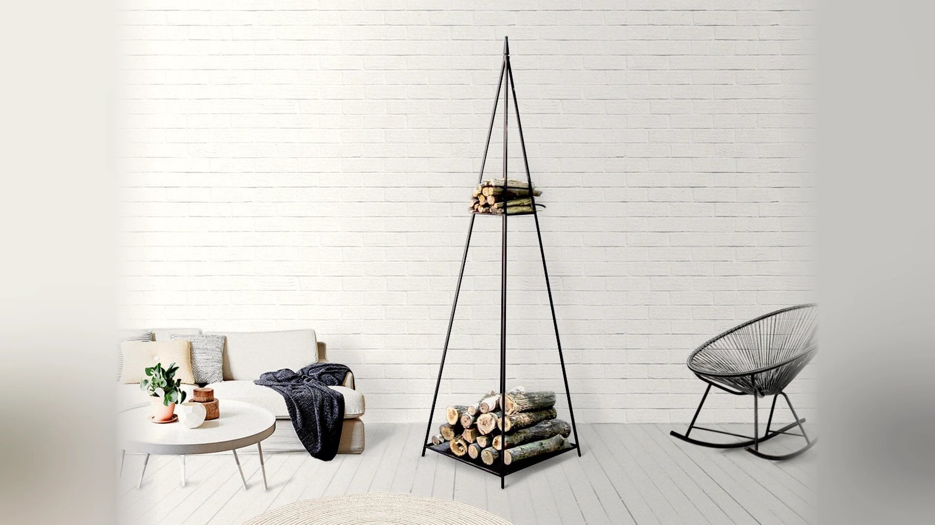 Black steel pyramid log holder in a bright white Scandinavian living room.