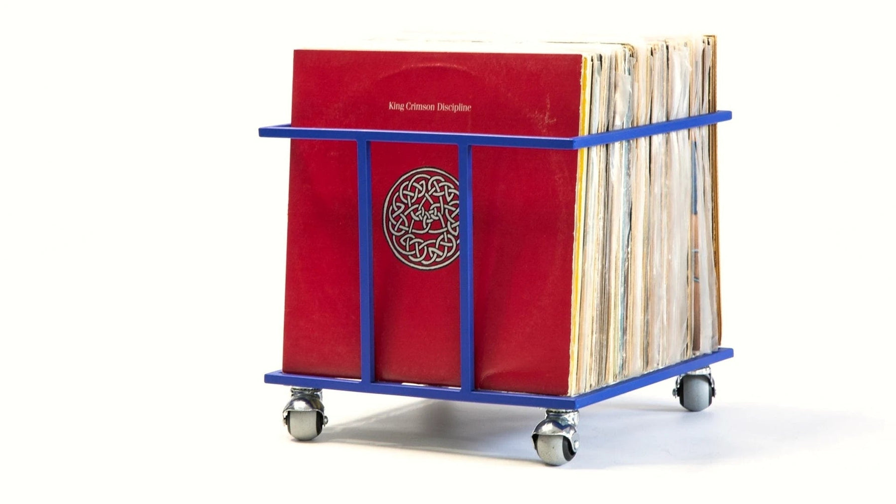 Steel vinyl crate on castors filled with LP records.