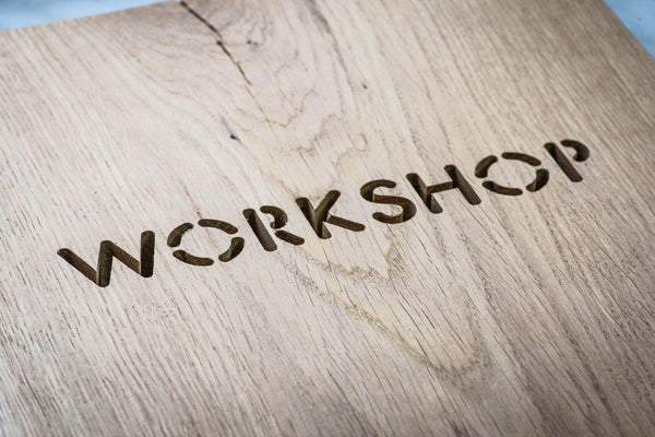 Atelier Article workshop mark burned into a wooden surface