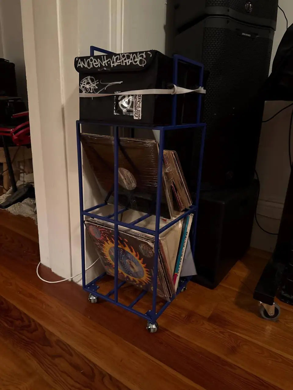 Customer photo of a blue Atelier Article Triple-Deck vinyl record cart in a home
