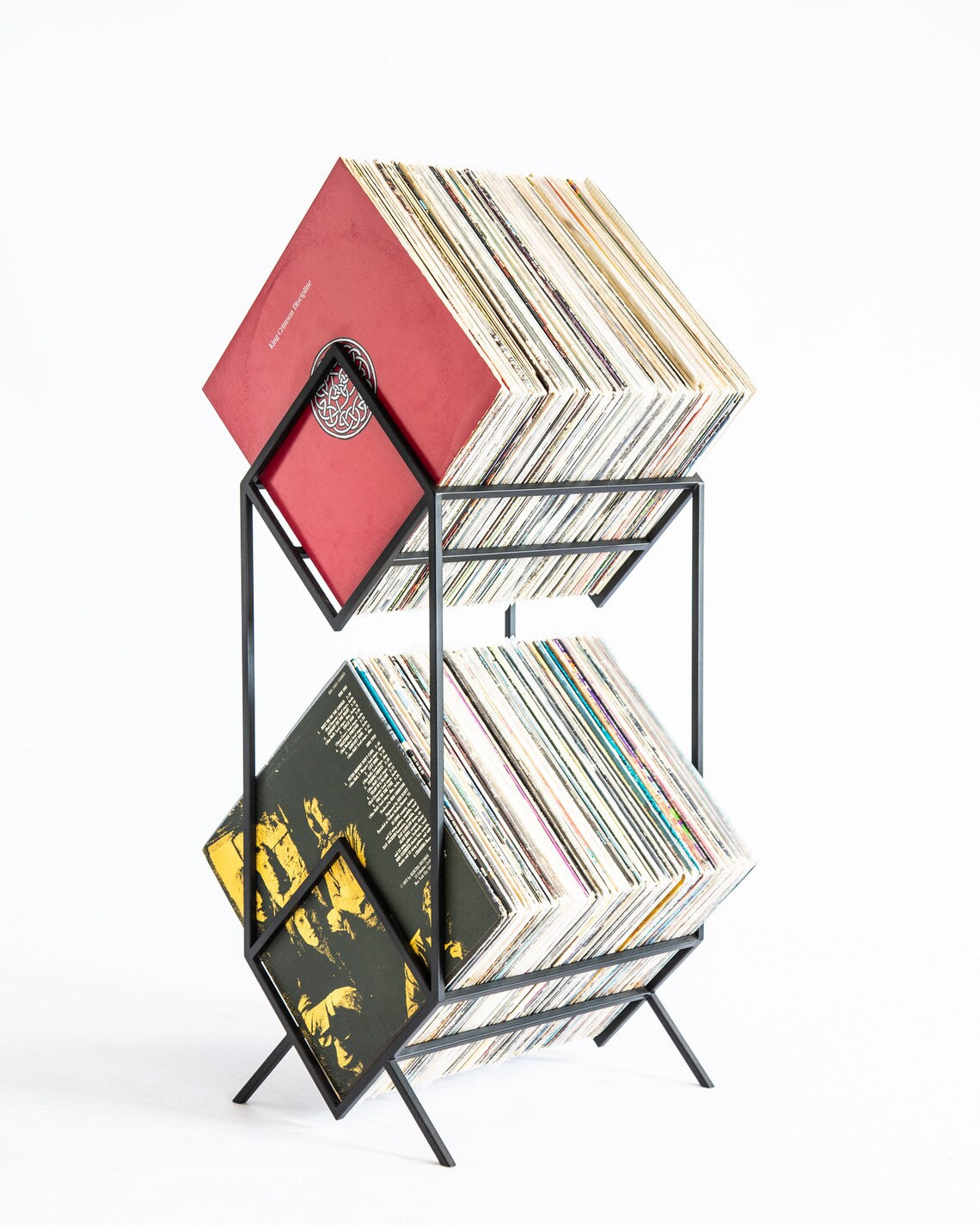 Black Atelier Article 2Romb two-tier vinyl record stand filled with LPs