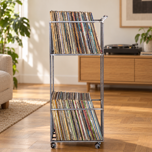 Side view of the Atelier Article Double-Deck steel record cart with two tiers of LPs in an AI-assisted listening-room scene.