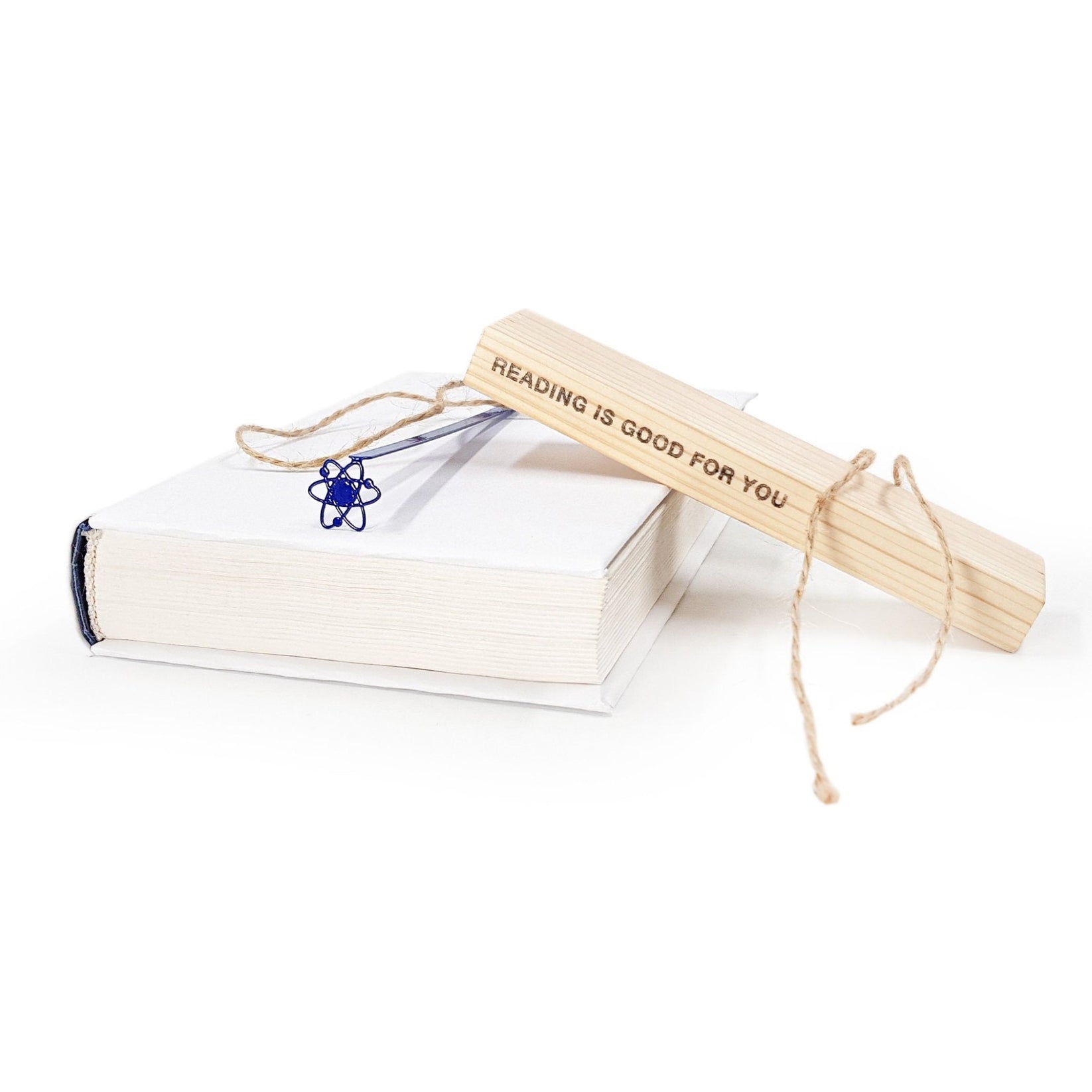 Atom metal bookmark in blue packed with kraft paper and twine as a gift