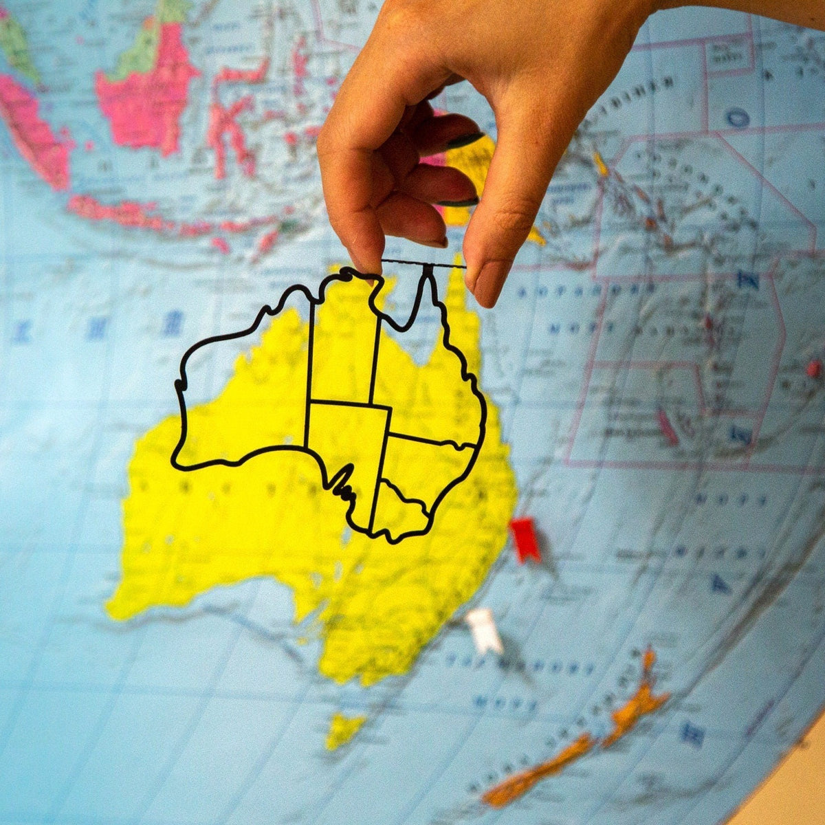 Australia metal bookmark on a coloured background