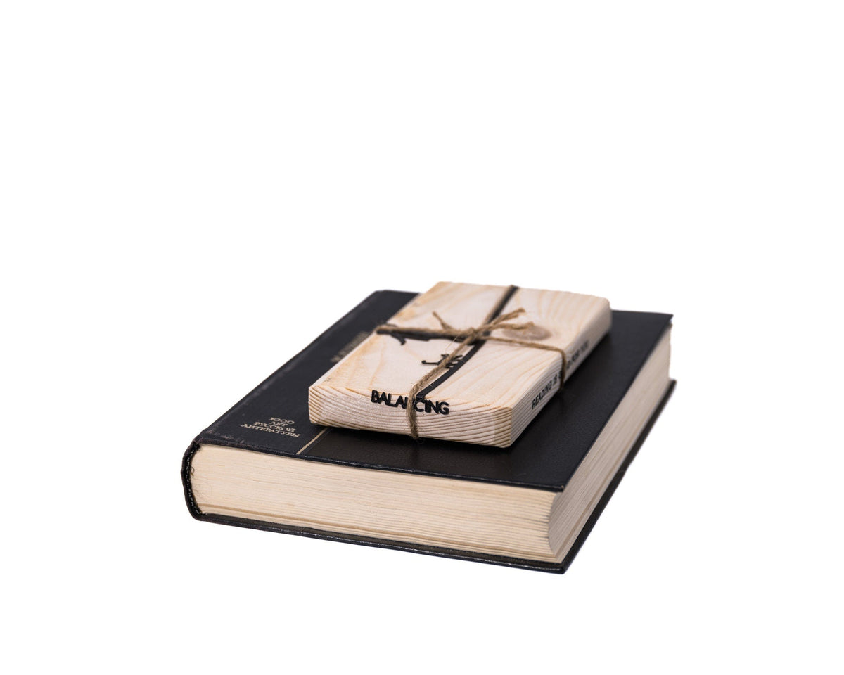 Balancing Act metal bookmark with the engraved wooden gift block it ships with