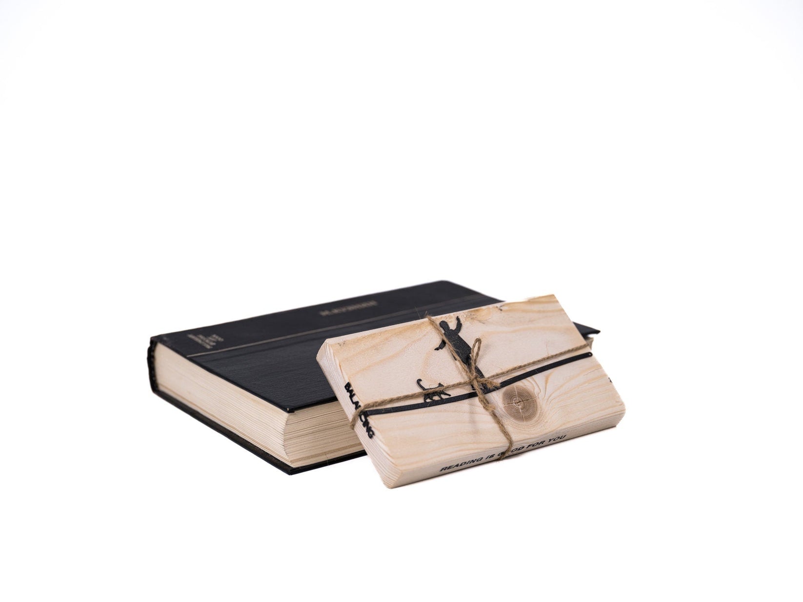 Balancing Act metal bookmark packed with kraft paper and twine as a gift