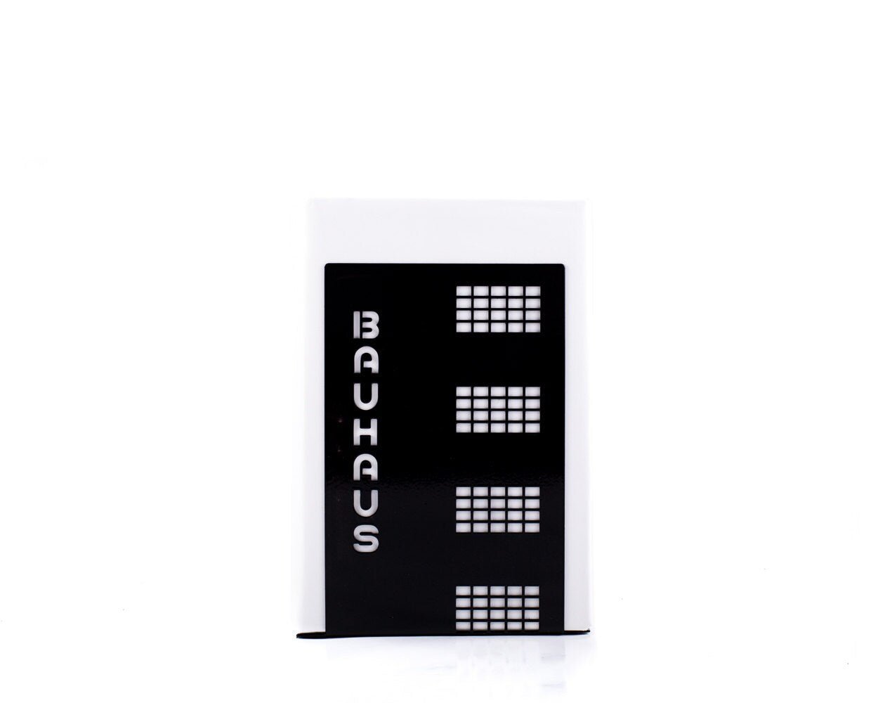 Black Bauhaus building metal bookends holding books