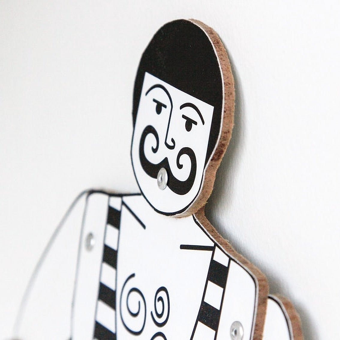 Geometric black and white strongman puppet in birch plywood with riveted movable joints