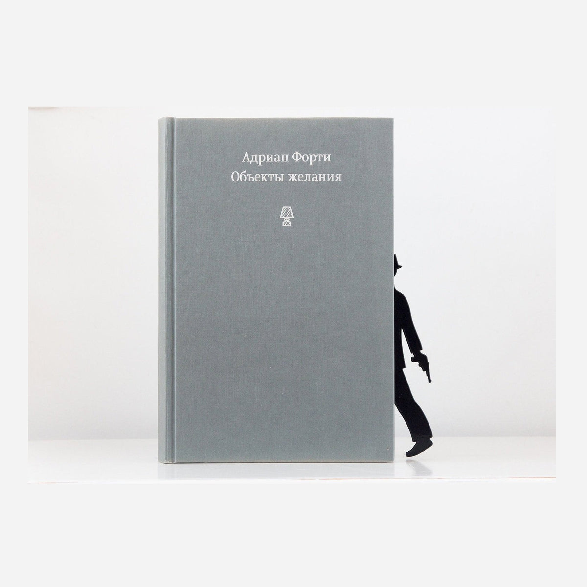 Book Dividers, Bookmarks Detective metal bookmark in a closed book, only its top showing above the pages
