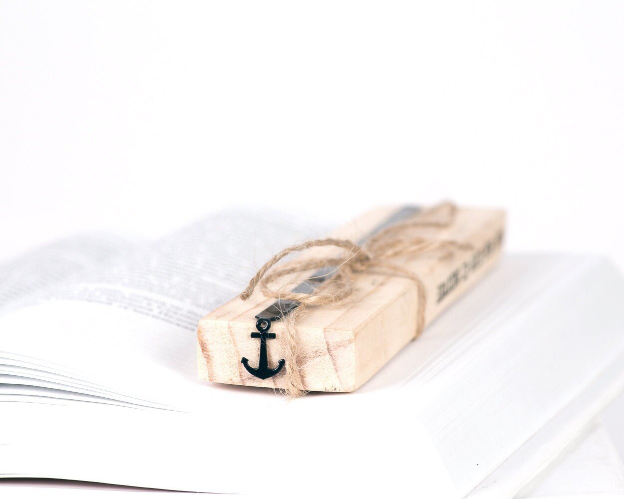 Anchor metal bookmark with the engraved wooden gift block it ships with