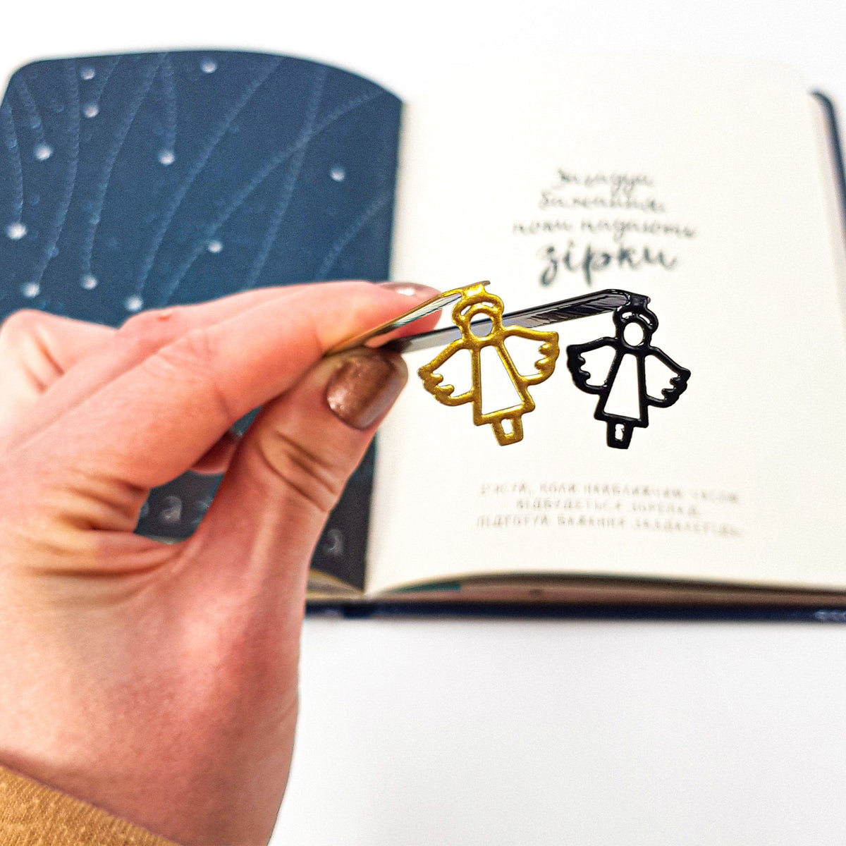 Angel metal bookmark shown together with other bookmarks from the range