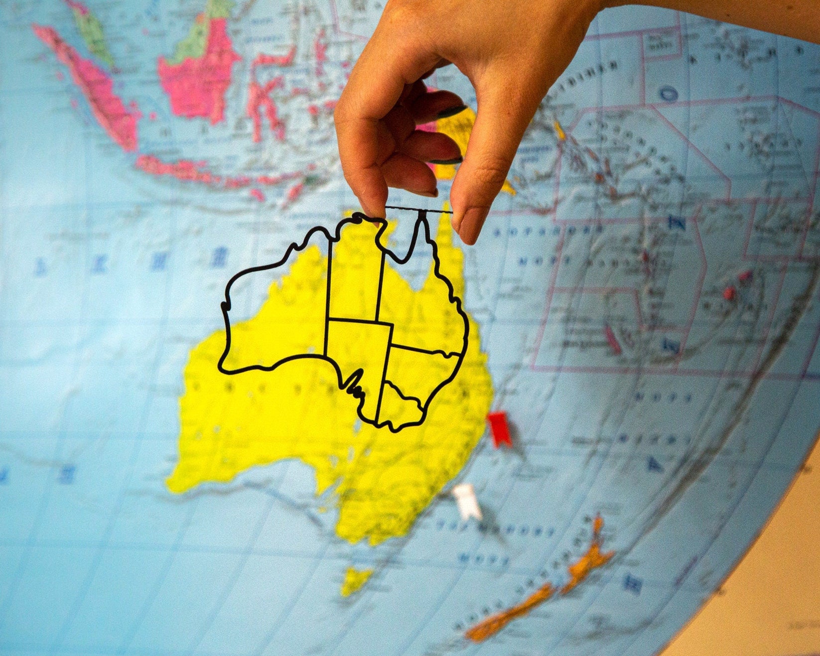 Australia metal bookmark on a coloured background