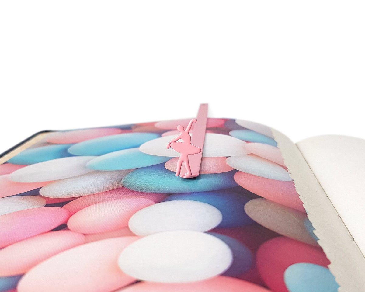 Ballet Dancer metal bookmark in red against a coloured backdrop