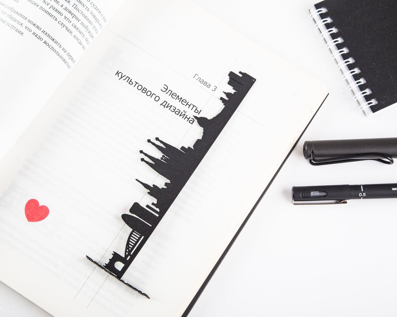 Barcelona Cityscape metal bookmark holding a place in a journal
