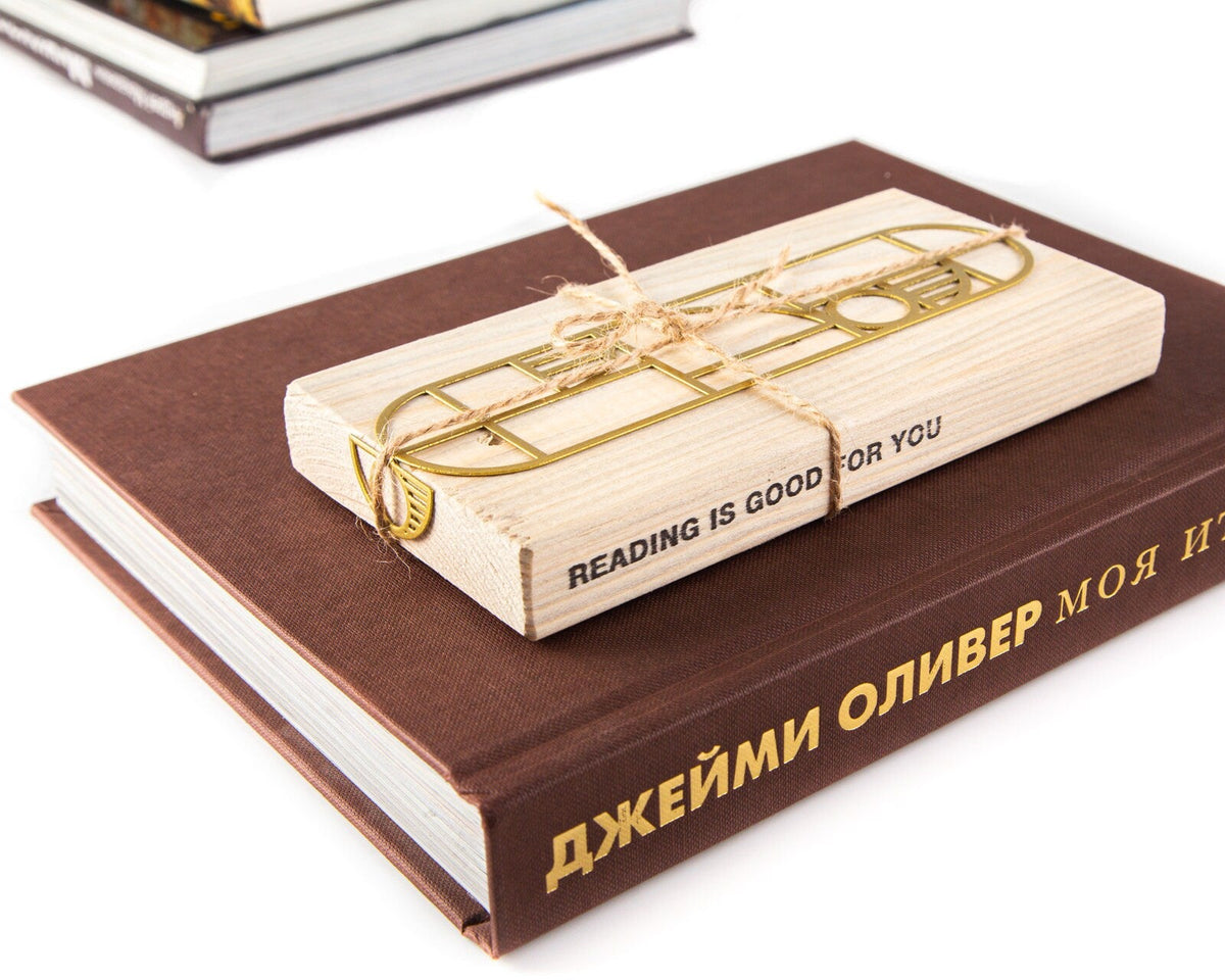 Bauhaus Geometry metal bookmark with the engraved wooden gift block it ships with