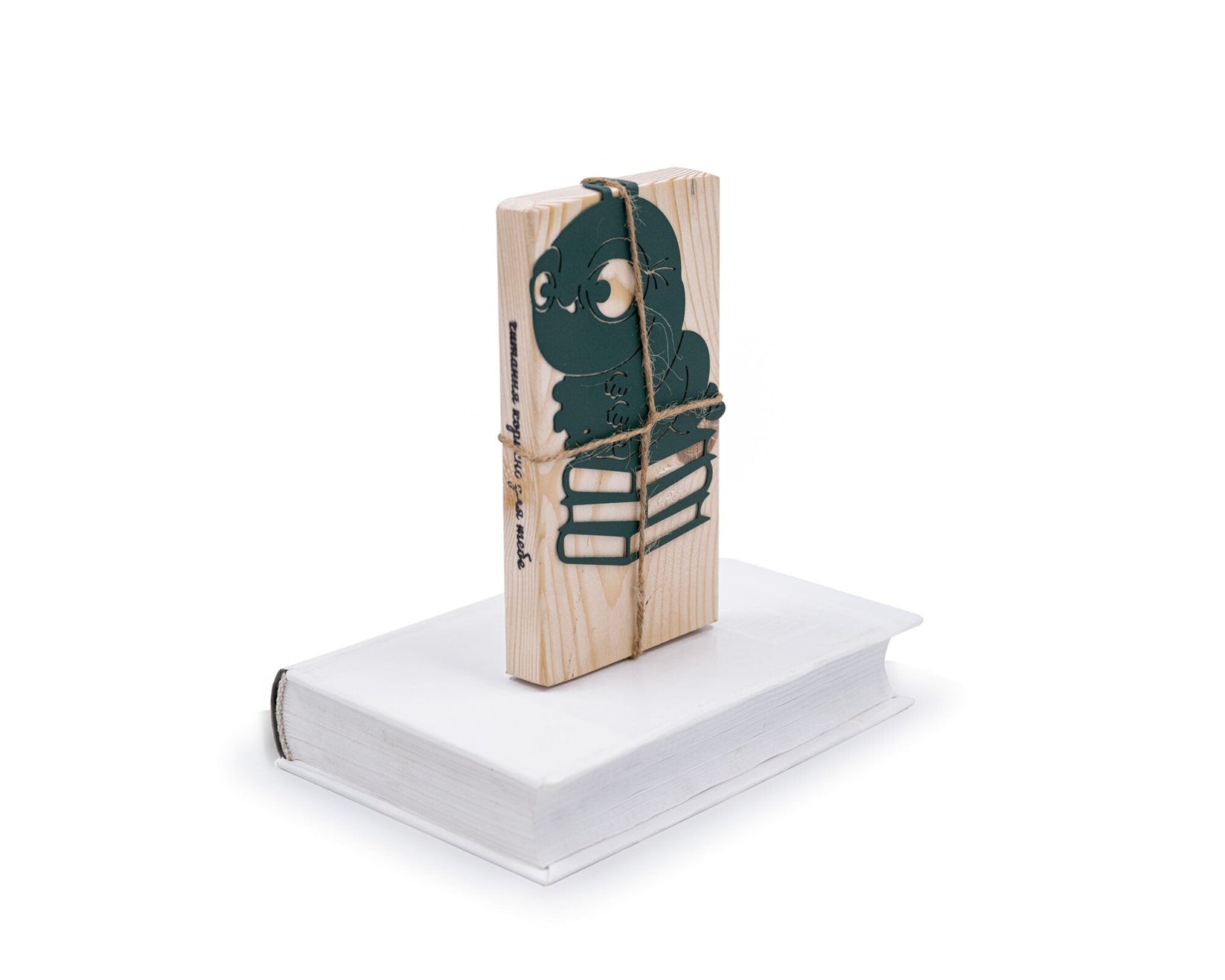 Bookworm metal bookmark in green packed with kraft paper and twine as a gift