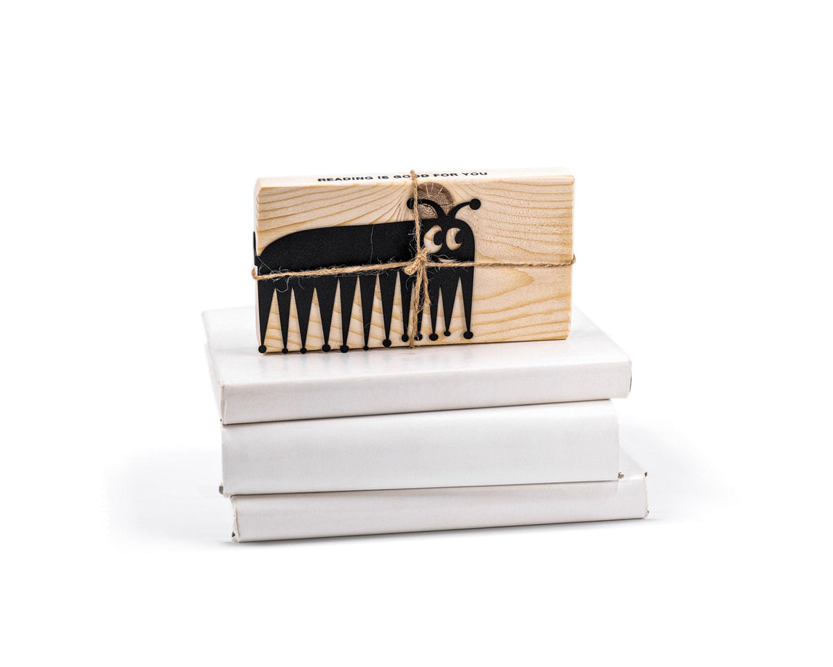Charming Centipede metal bookmark shown with its wooden gift block