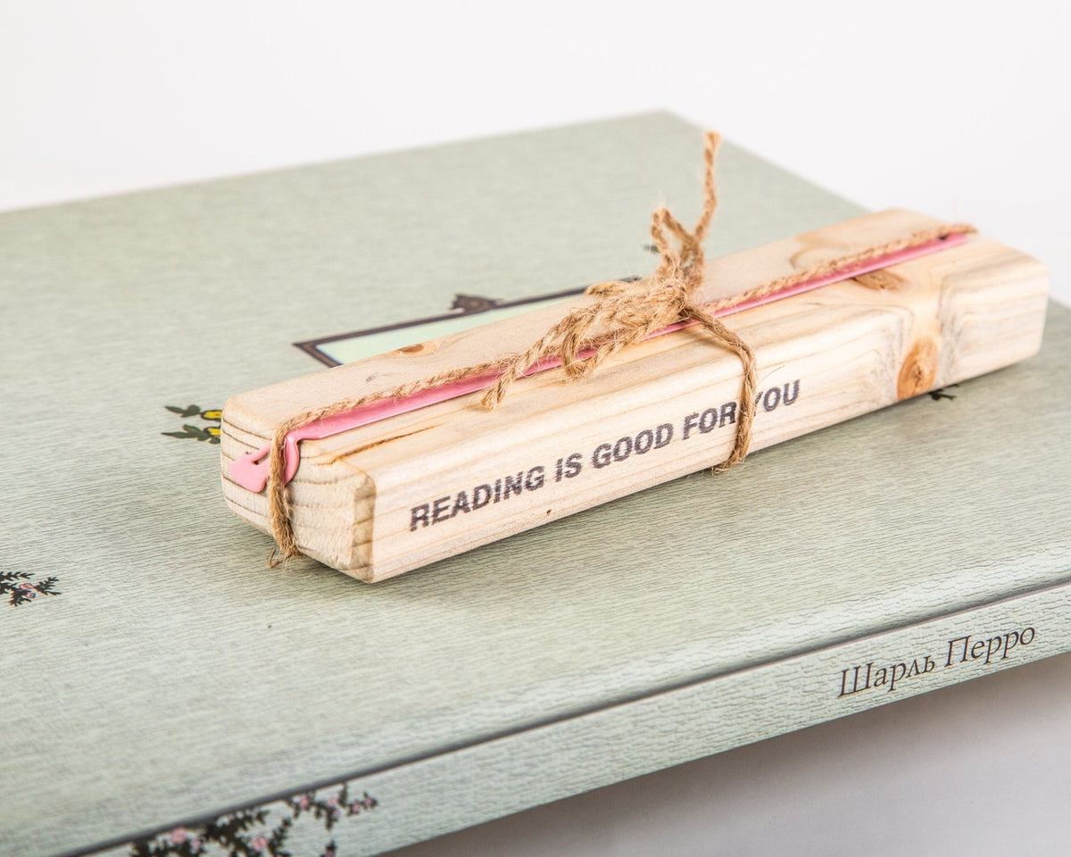 Cinderella's Slipper metal bookmark in red with the engraved wooden gift block it ships with