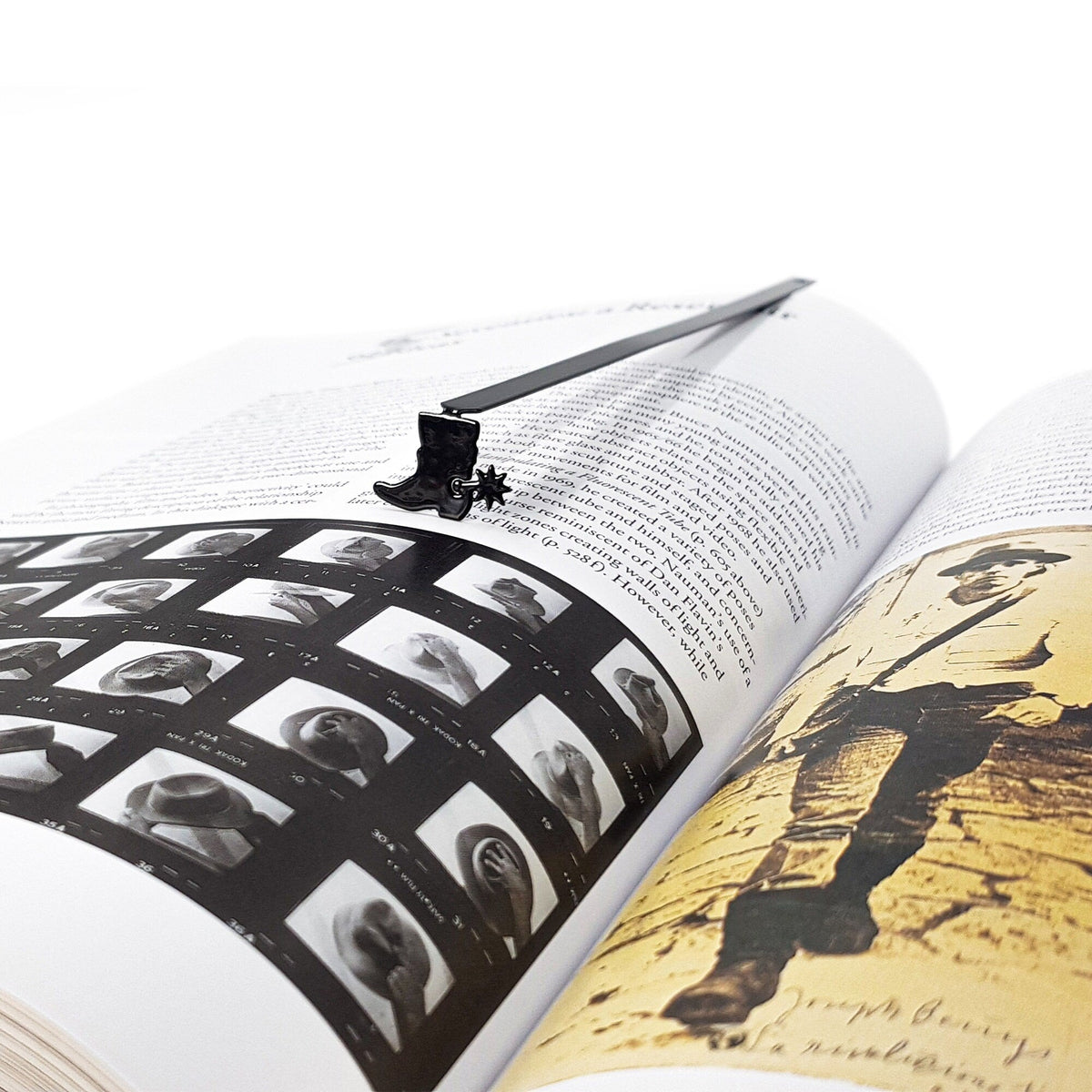 Cowboy's Boot metal bookmark placed on a colour illustration