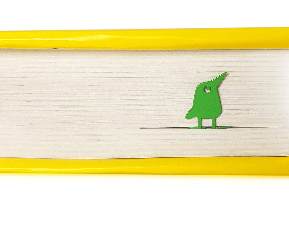 Crocodile and the Nile Bird metal bookmark in green on a coloured background