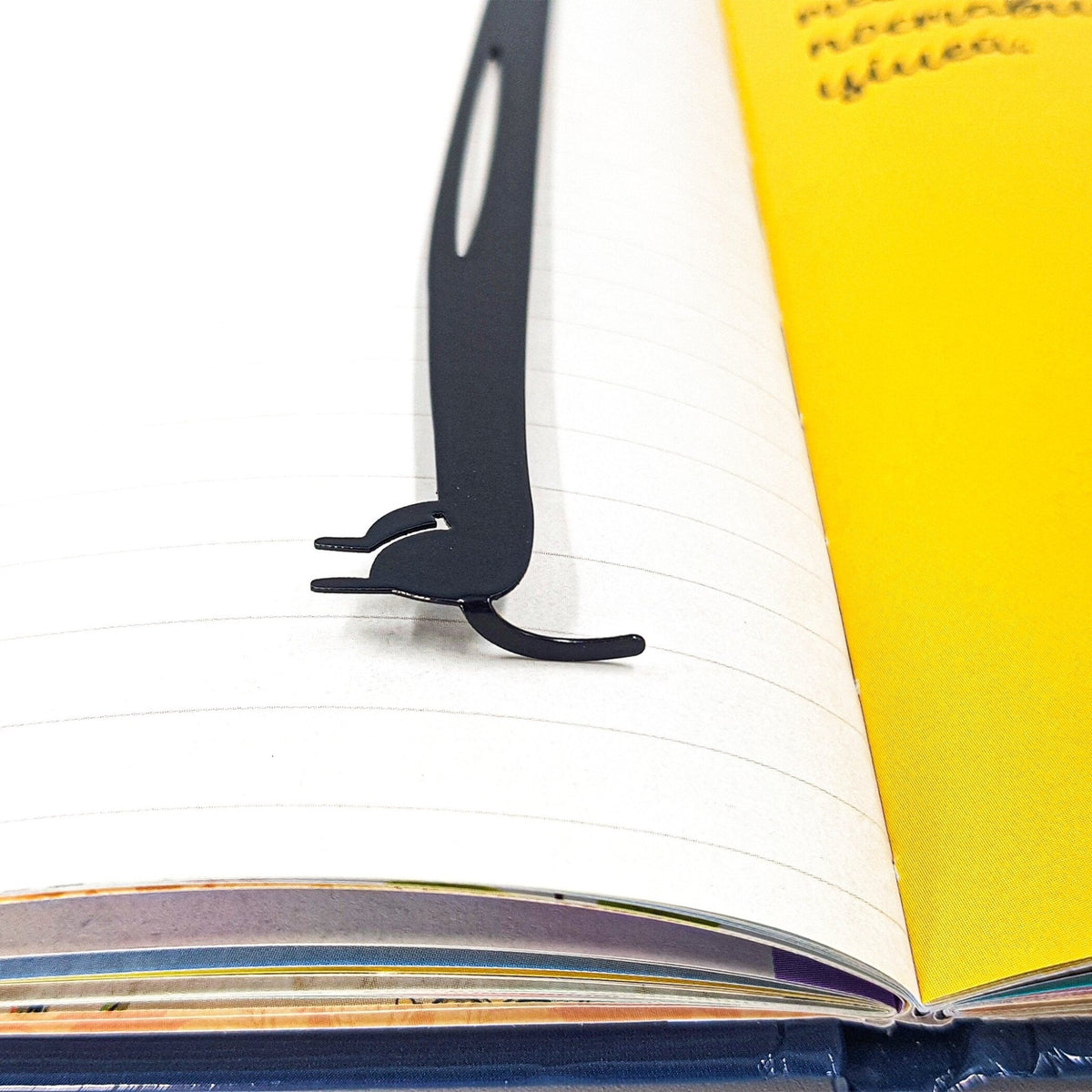 Dachshund My Long Time Friend metal bookmark on an illustrated page