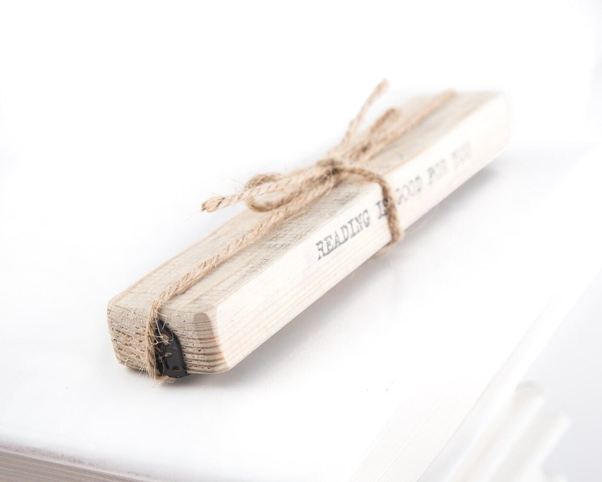 Enchanted Rose metal bookmark with the engraved wooden gift block it ships with