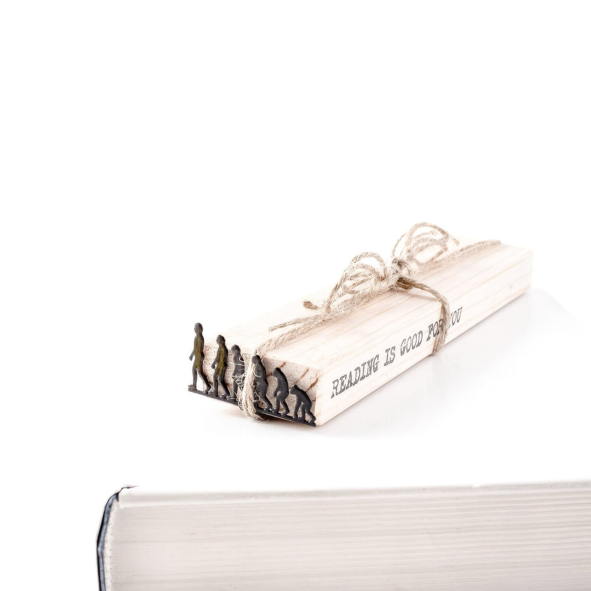Evolution metal bookmark packed with kraft paper and twine as a gift