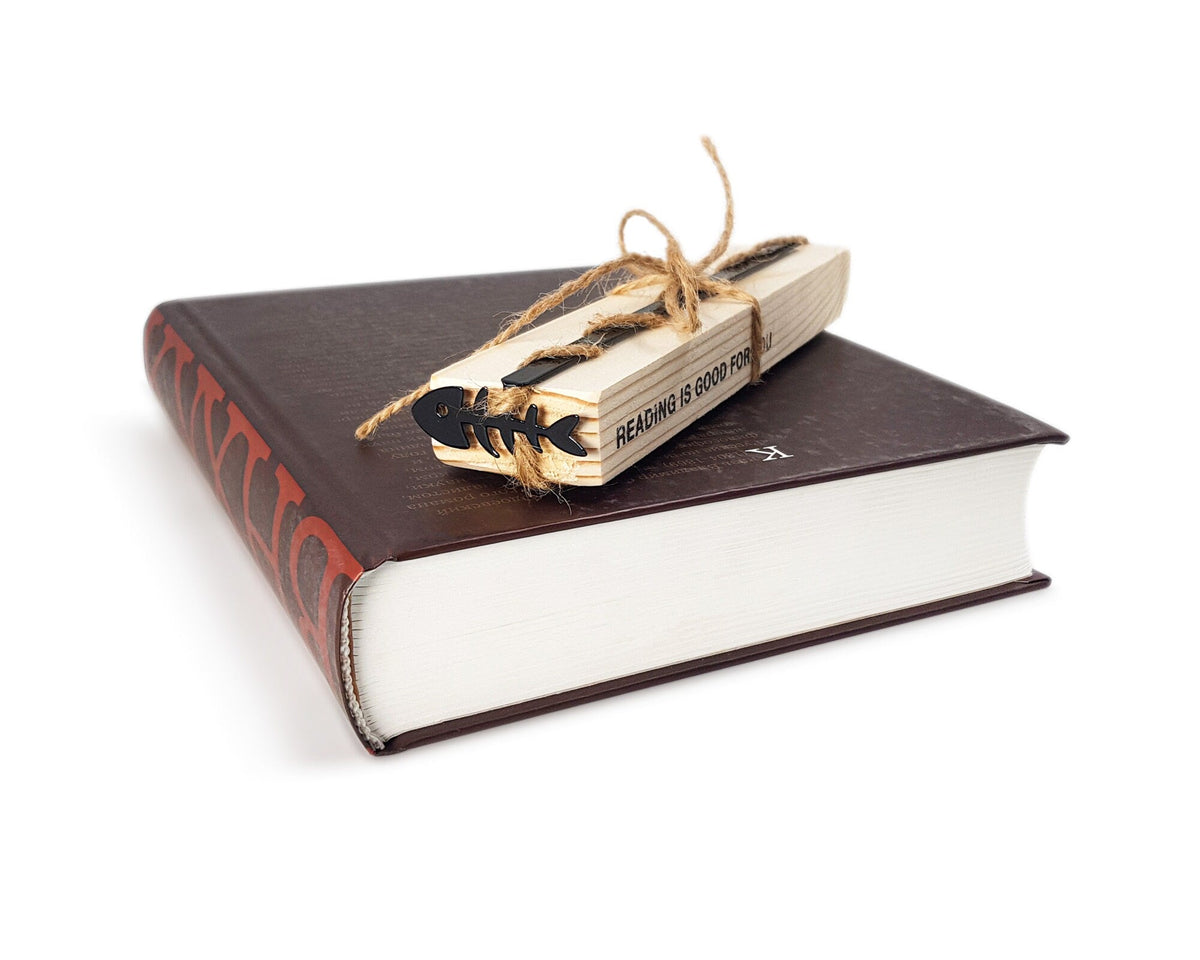 Fishbone metal bookmark packed with kraft paper and twine as a gift