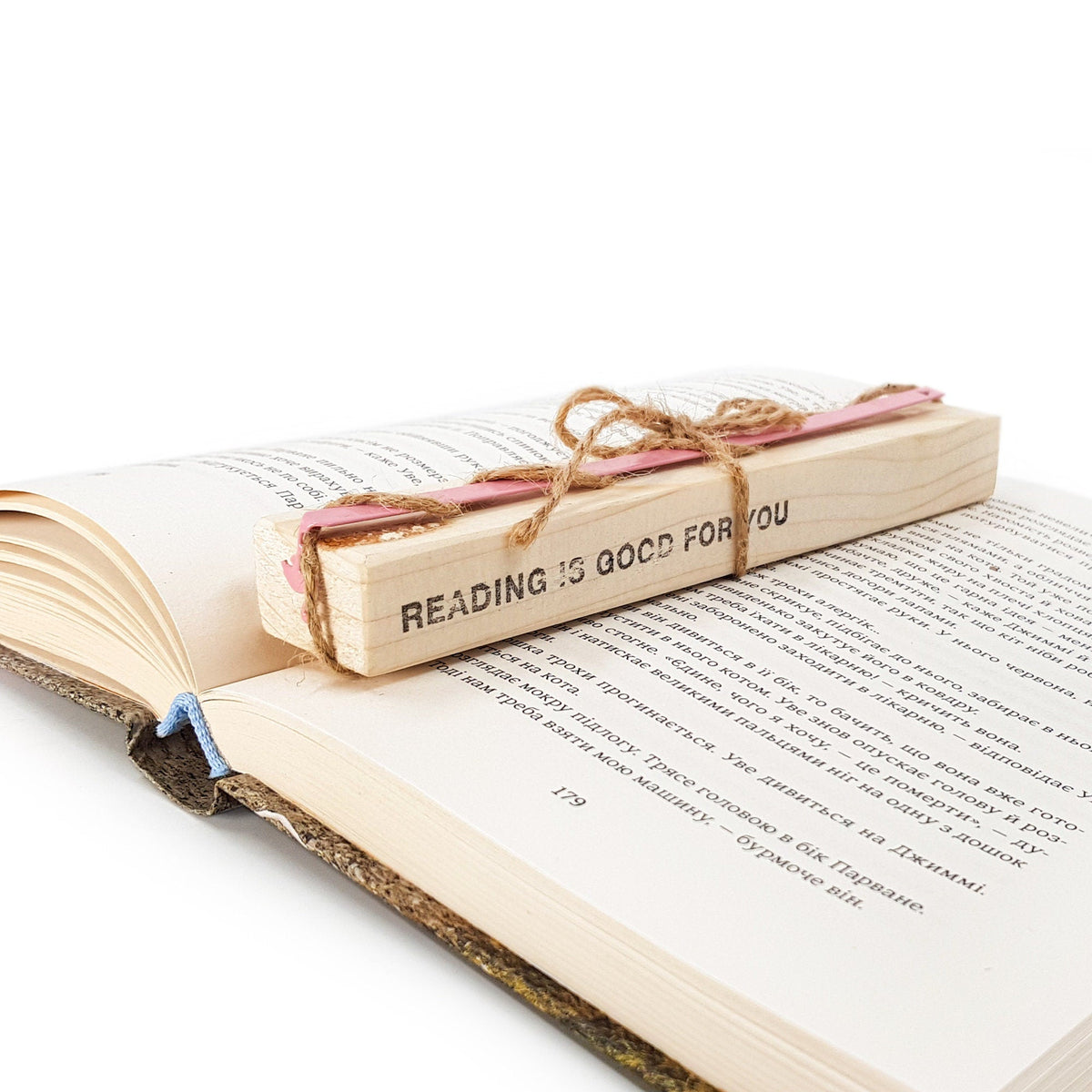 Flamingo metal bookmark with the engraved wooden gift block it ships with