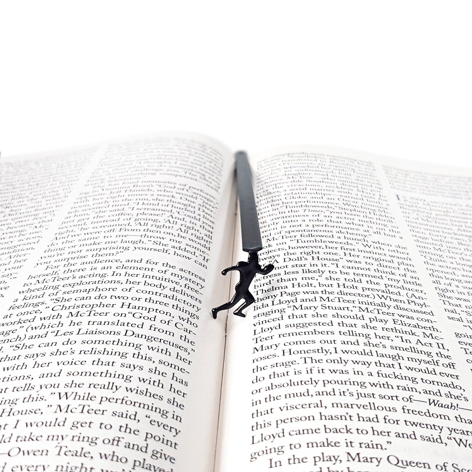 Football Player metal bookmark set into the gutter of an open book