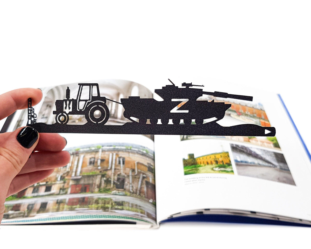Good Evening We Are from Ukraine metal bookmark on an illustrated page