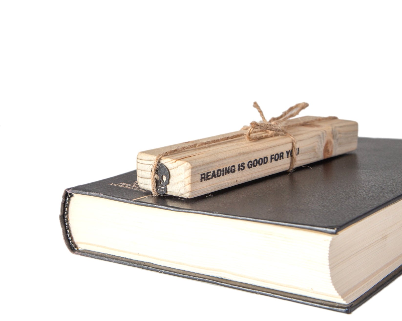 Grinning Skull metal bookmark with the engraved wooden gift block it ships with