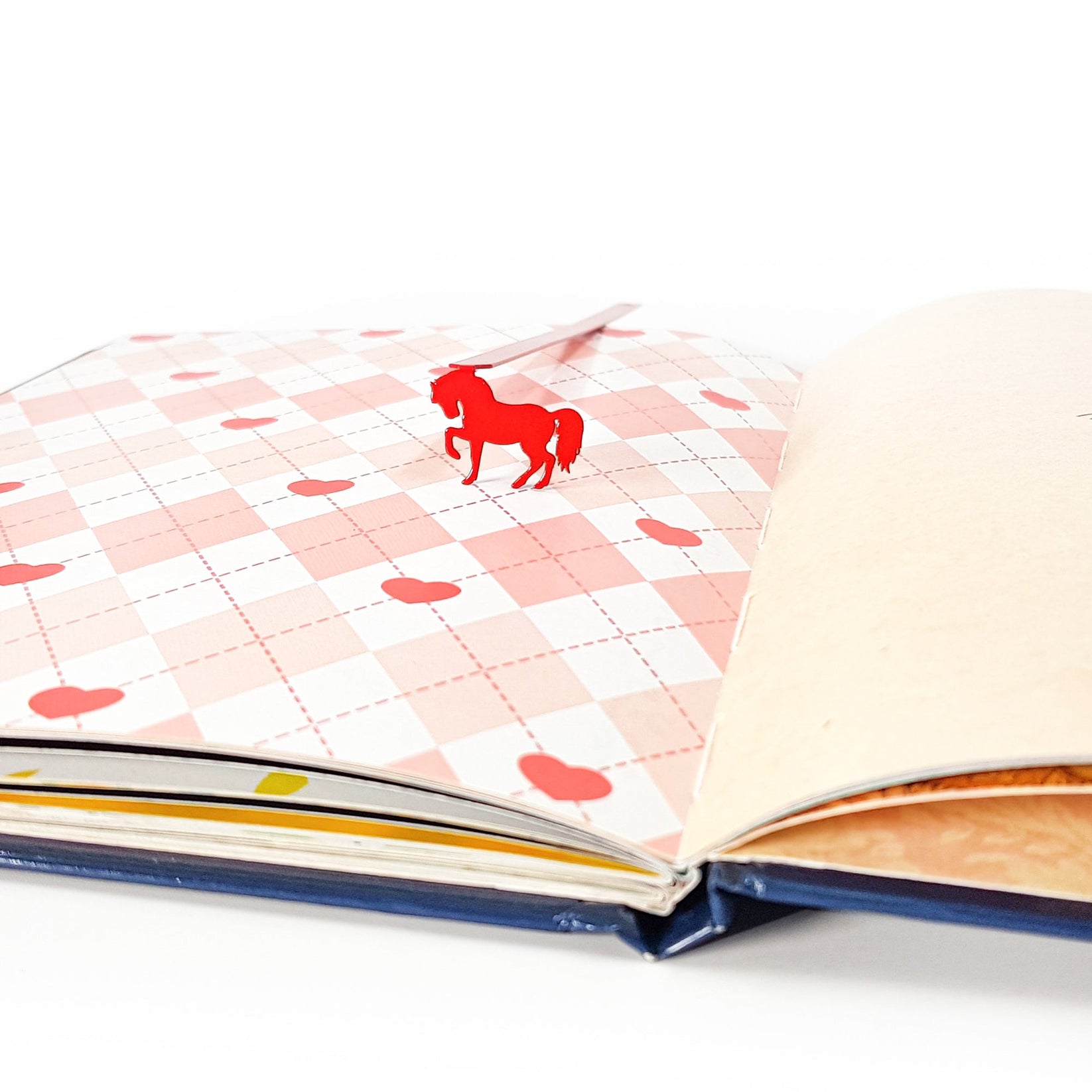Horse metal bookmark in red on a coloured background