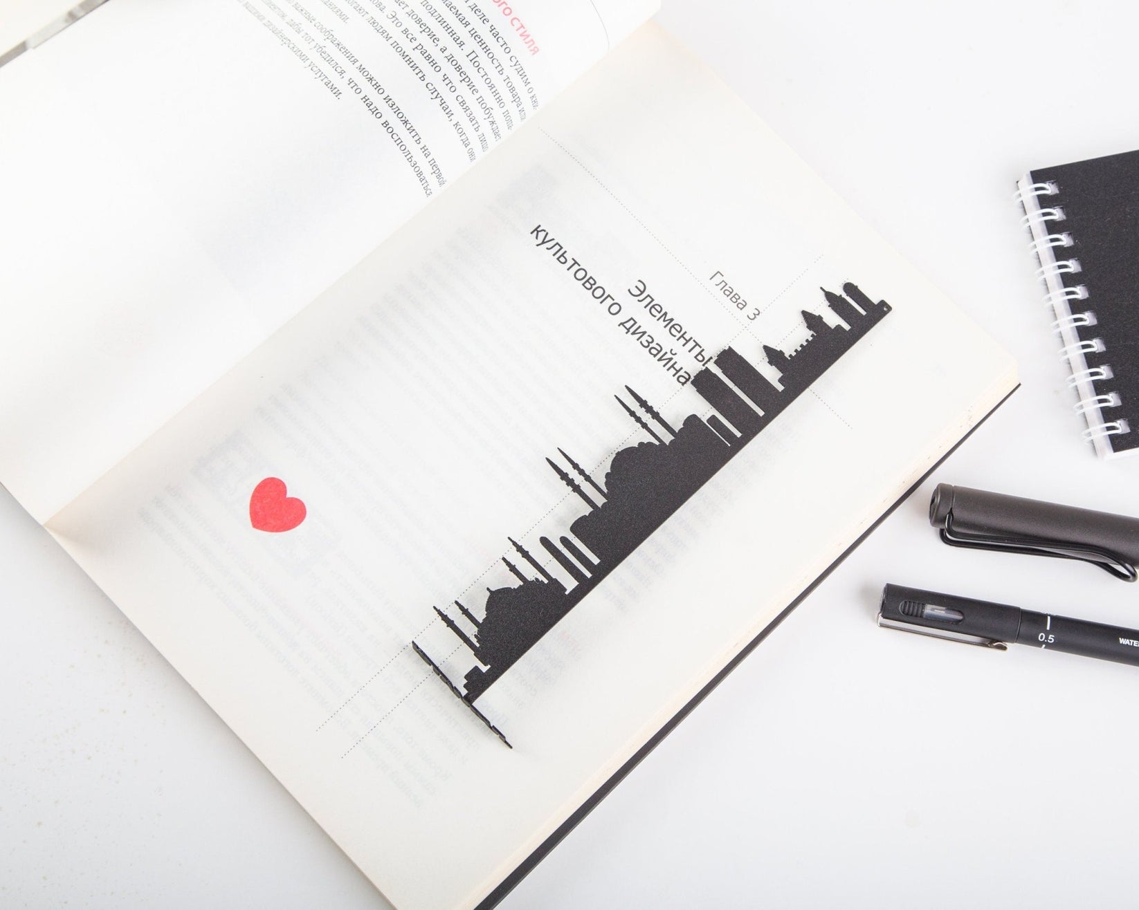 Istanbul metal bookmark tucked into a notebook