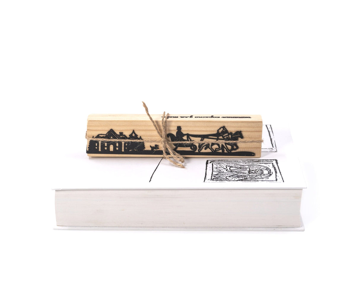 Winter Sleigh Ride metal bookmark packed with kraft paper and twine as a gift