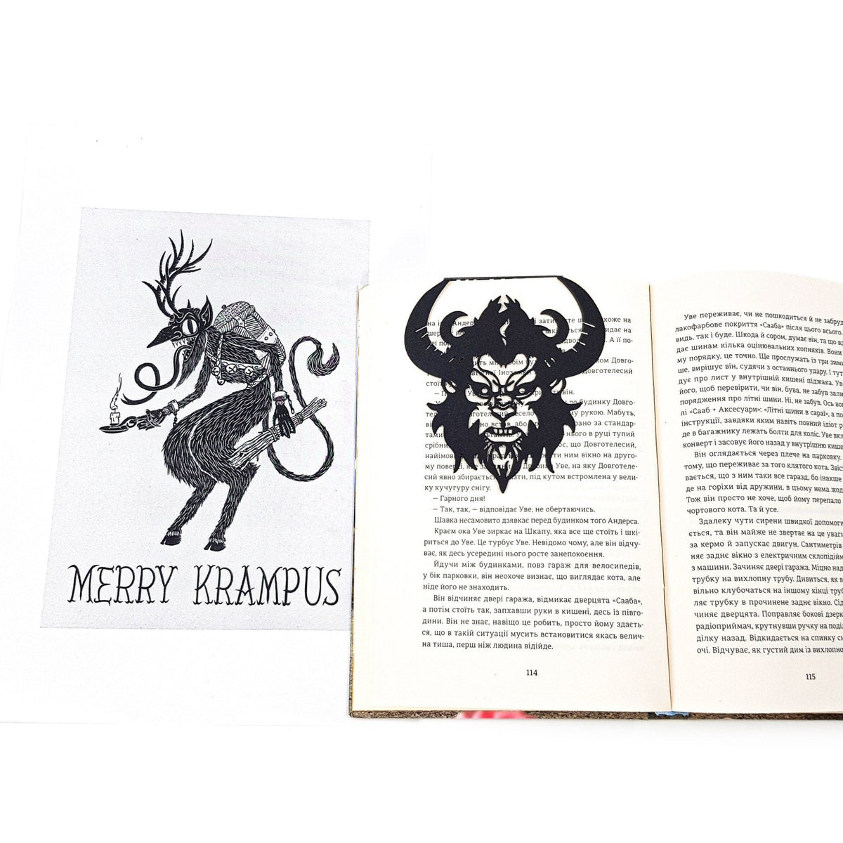 Krampus metal bookmark on an illustrated page
