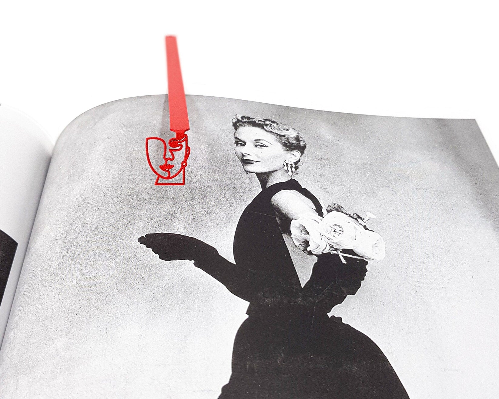 Lady in Red metal bookmark in red on an illustrated page, view 5