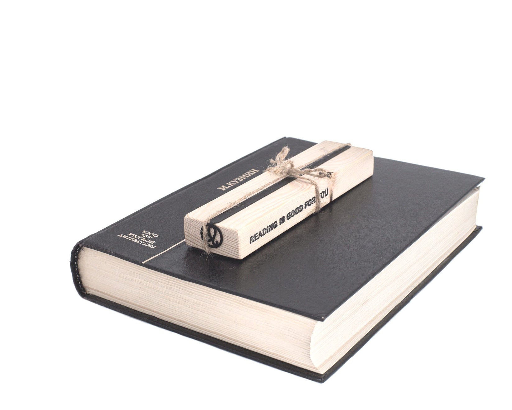 Leo metal bookmark with the engraved wooden gift block it ships with