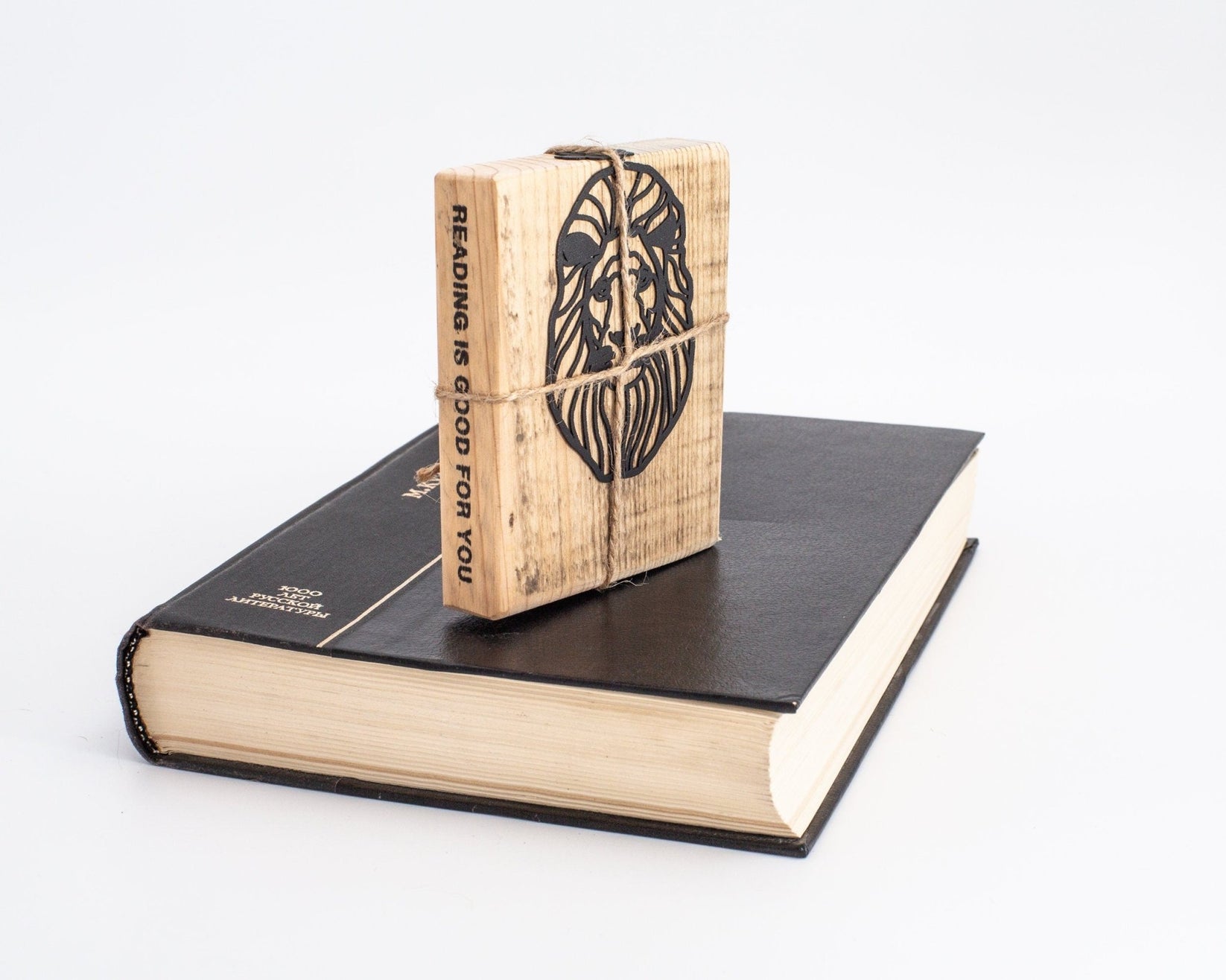 Lion Head metal bookmark with the engraved wooden gift block it ships with