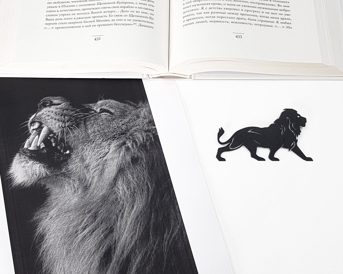 Lion, The King of Animals metal bookmark on an illustrated page
